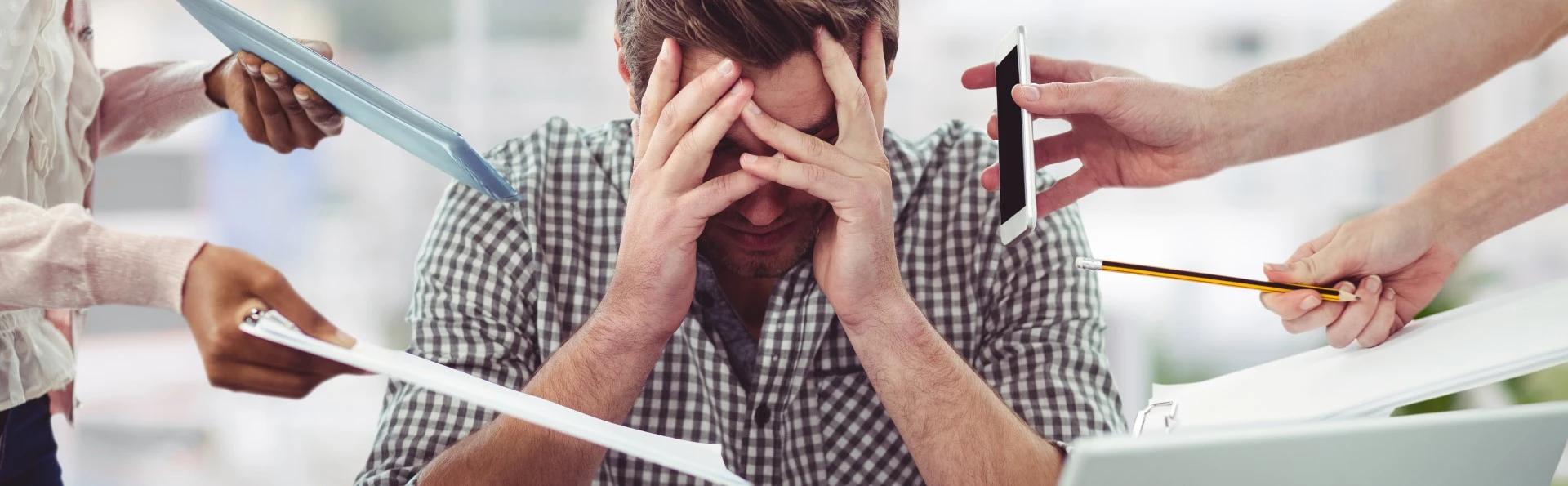 man overwhelmed by everything